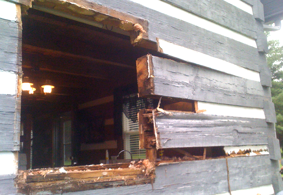 photo of cabin with damage